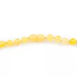 Borostyán nyaklánc, csiszolt, 6-6,5 mm golyó, vajszínű, 48 cm